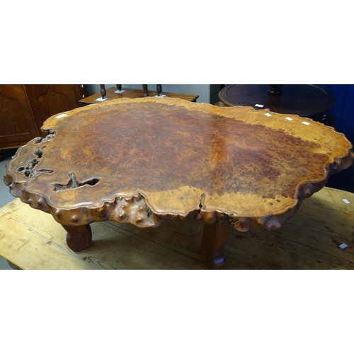 459 - Well figured burr wood coffee table with scrolled legs.  1M diameter approx.  (B.P. 21% + VAT)