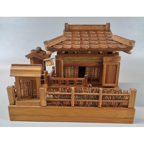 49 - Miniature Japanese model study of a doll's Tea house.  (B.P. 21% + VAT)