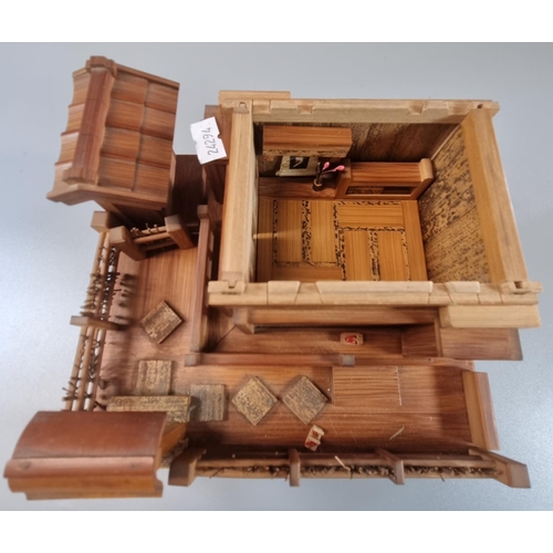 49 - Miniature Japanese model study of a doll's Tea house.  (B.P. 21% + VAT)