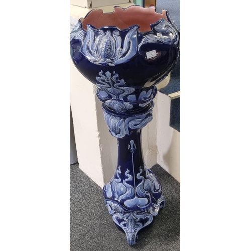 69 - Art Nouveau design blue ceramic jardinière on stand, the jardinière with impressed marks 'Vulcan', s... 