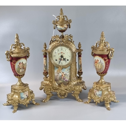 73 - 19th century style continental brass and porcelain two train clock garniture set depicting figural a... 