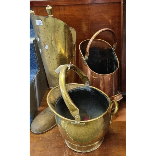 83 - Collection of copper and brass to include: coal scuttles, companion set in the form of a boot etc.  ... 