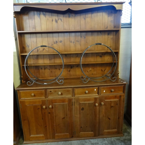 473 - Modern pine rack backed dresser, three fitted shelves above base with four moulded frieze drawers an... 