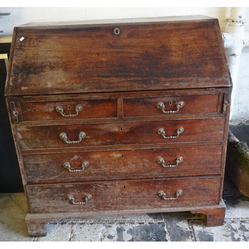 476 - Georgian mahogany fall front bureau, having an arrangement of two short and three long drawers on br... 