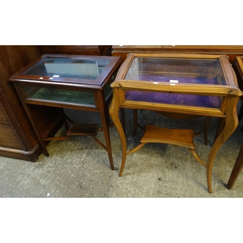 484 - Two Edwardian glazed Bijouterie cabinets, both with glazed tops, one with satinwood cross banding.  ... 