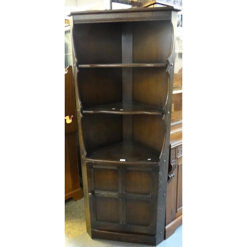 492 - Ercol type stained elm corner cupboard with two shelves.  (B.P. 21% + VAT)