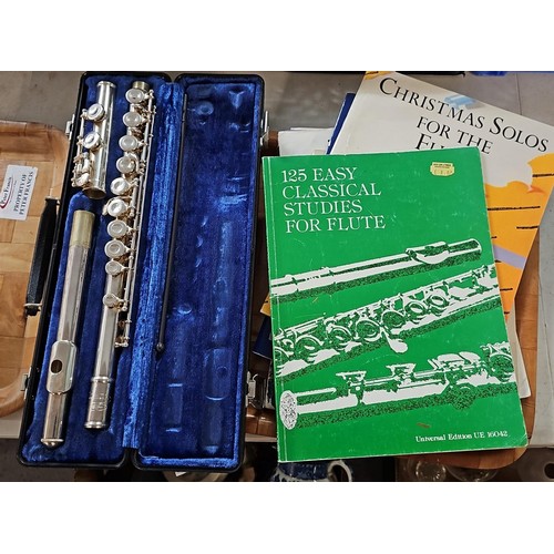 364 - Cased Beuscher flute with various music books  
(B.P. 21% + VAT)