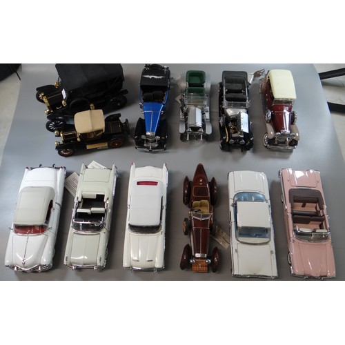 375 - Two plastic boxes of Franklin Mint diecast model vehicles, all appearing in their original boxes and... 