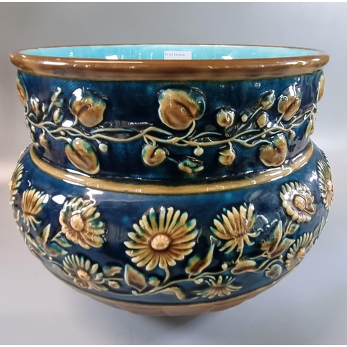 115 - Late 19th Century majolica jardiniere decorated with relief flowers and foliage with basket weave to... 