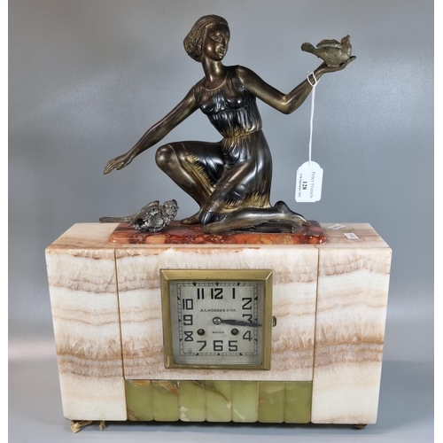 128 - Art Deco French marble and onyx two train mantel clock, the face marked 'A Lagerre D'Or Rouen' with ... 