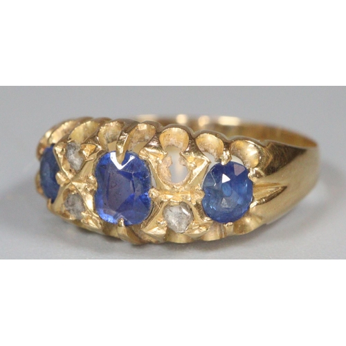 193 - Victorian gold six stone diamond and blue stone ring. Indistinct hallmarks, missing one stone. 2.7g ... 