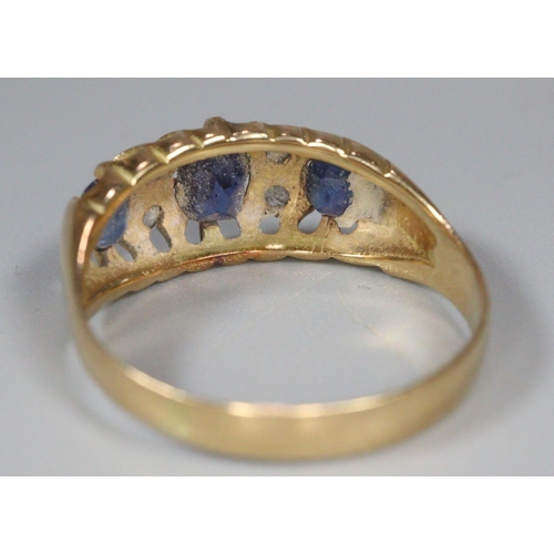 193 - Victorian gold six stone diamond and blue stone ring. Indistinct hallmarks, missing one stone. 2.7g ... 