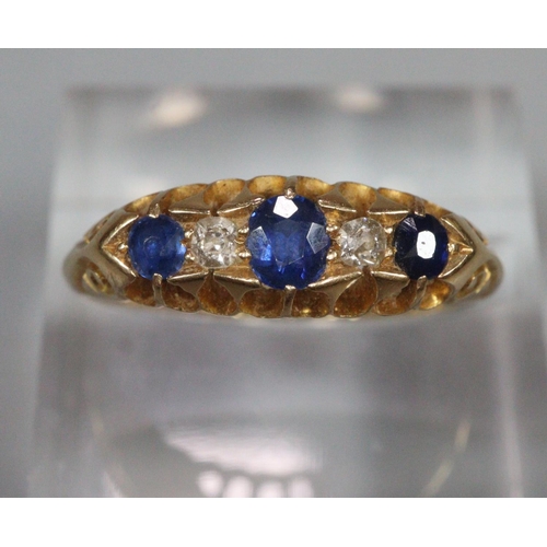 197 - 18ct gold diamond and sapphire five stone ring. 3.5g approx. Ring size O & 1/2.
(B.P. 21% + VAT)