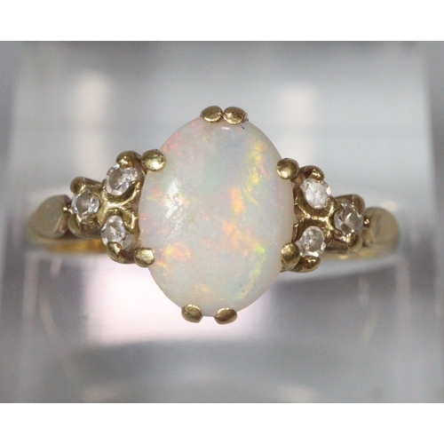 202 - 18ct gold diamond and opal ring. 3g approx, ring size O & 1/2.
(B.P. 21% + VAT)