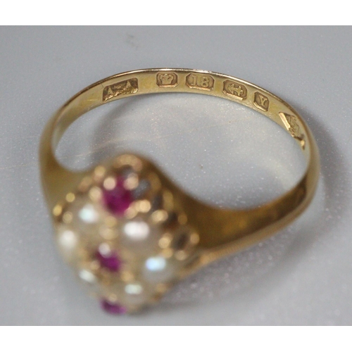 203 - Victorian 18ct gold lozenge shaped ruby and seed pearl ring. Birmingham hallmarks. 2.7g approx. Ring... 