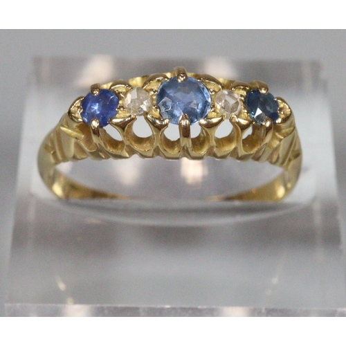 207 - 18ct gold Victorian five stone diamond and probably sapphire ring. Birmingham hallmarks. 3.6g approx... 