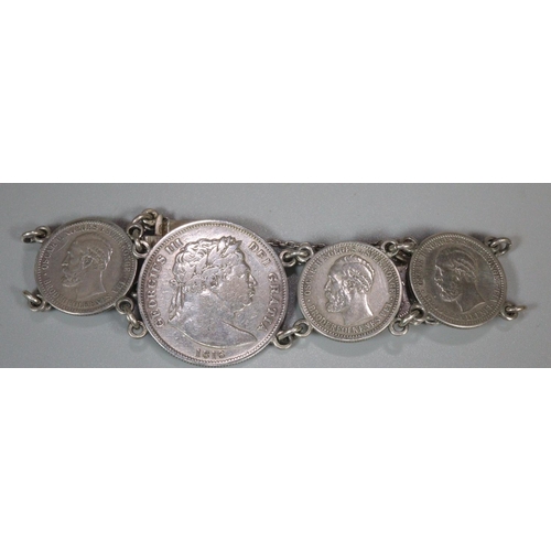 209 - Silver seven coin bracelet featuring 50 Ore Danish coins. 
(B.P. 21% + VAT)