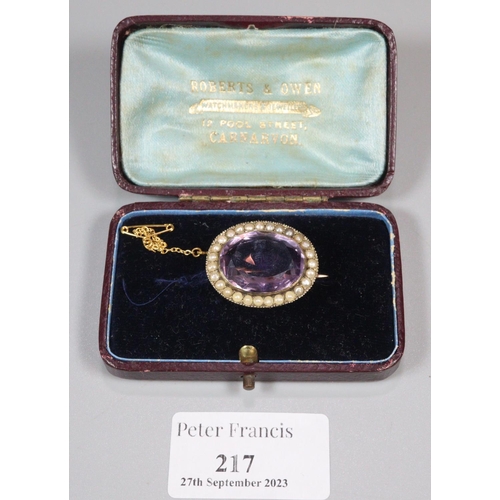 217 - 19th Century yellow metal amethyst and pearl brooch appearing in original leather box with retailers... 