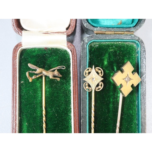 223 - Cased yellow metal stock pin with inset diamond. 2.4g approx. Together with another Victorian yellow... 