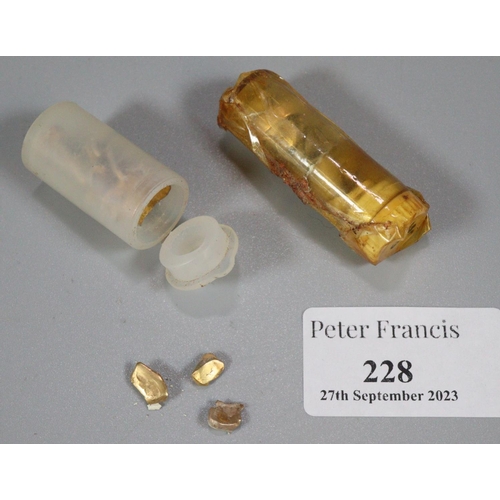 228 - Two plastic tubs comprising dental gold.
(B.P. 21% + VAT)