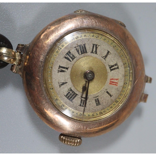 245 - Early 20th Century ladies 9ct gold wristwatch with leather strap and Roman numerals. 
(B.P. 21% + VA... 