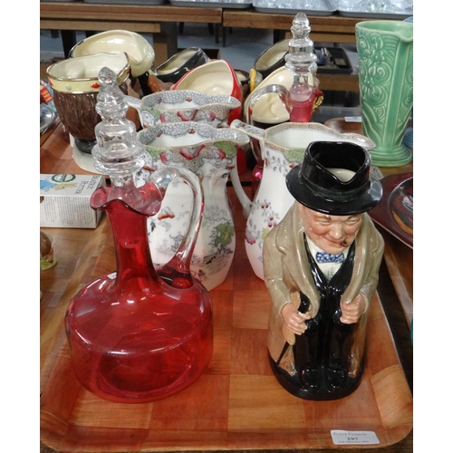 297 - Tray of china and glass to include: Royal Doulton 'Winston Churchill' toby jug, set of three graduat... 