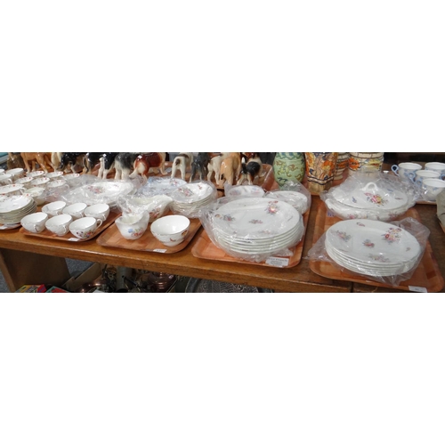 301 - Four trays of Coalport floral design items to include: teacups and saucers, various plates, bowls, s... 