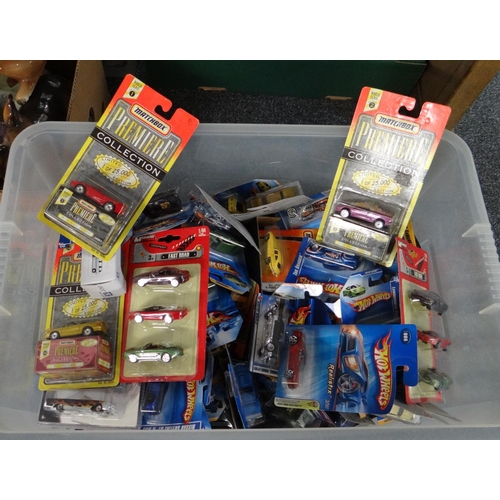 310 - Large box of assorted diecast model vehicles, all in original packaging to include: a large collecti... 