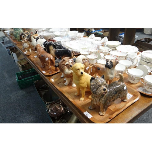 316 - Three trays of ceramic dogs to include: Coopercraft, Melba ware and others; Corgi, Beagle, Schnauzer... 