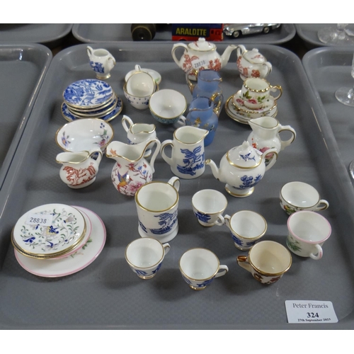 324 - Tray of miniature dollshouse mostly china items to include: Royal Worcester 'Enchantment' plates, Ma... 