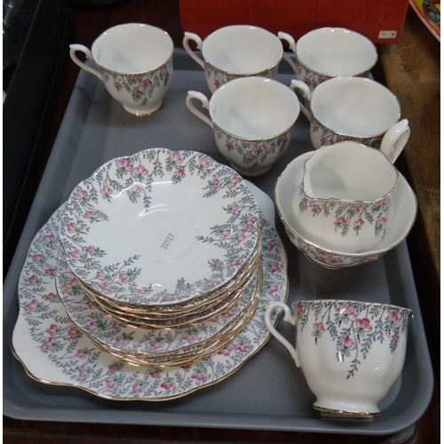 335 - Tray of Royal Albert 'Rosedrop' design teaware to include: teacups and saucers, plates, milk jug, su... 