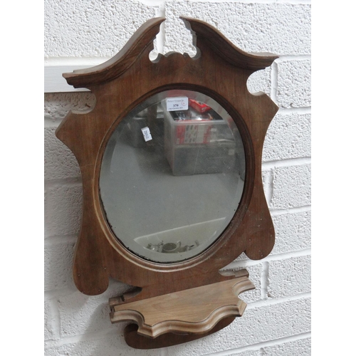 379 - Two similar 19th Century fret cut pier mirrors, together with an Art Nouveau style bevelled mirror w... 