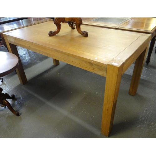 452 - Modern oak kitchen table of rectangular form on square legs. 
(B.P. 21% + VAT)