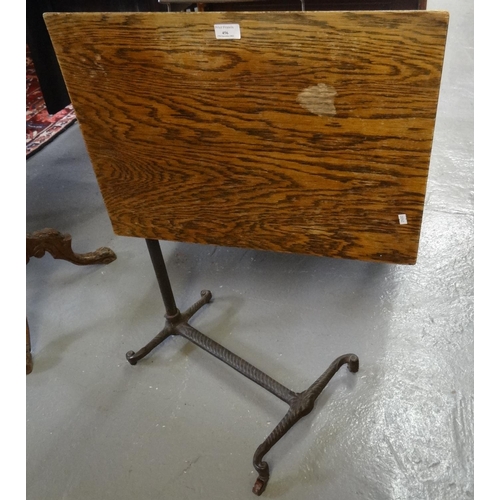 456 - Late Victorian oak and cast iron adjustable reading table.
(B.P. 21% + VAT)