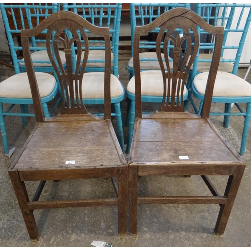 466 - Pair of early 19th Century oak camel back farmhouse kitchen chairs. (2)
(B.P. 21% + VAT)