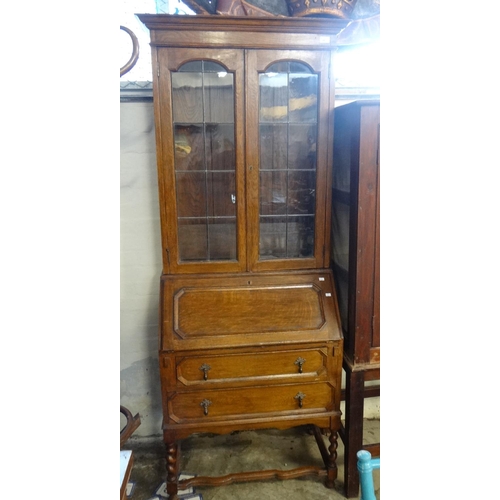 468 - Early 20th Century oak two stage glazed and leaded bureau bookcase.
(B.P. 21% + VAT)