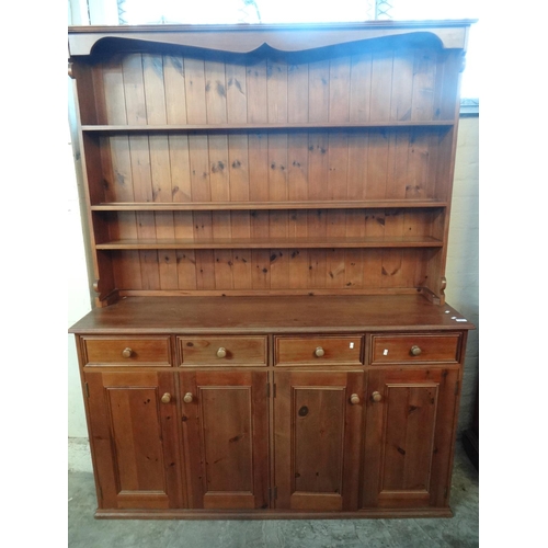 475 - Modern pine rack backed dresser, three fitted shelves above base with four moulded frieze drawers an... 