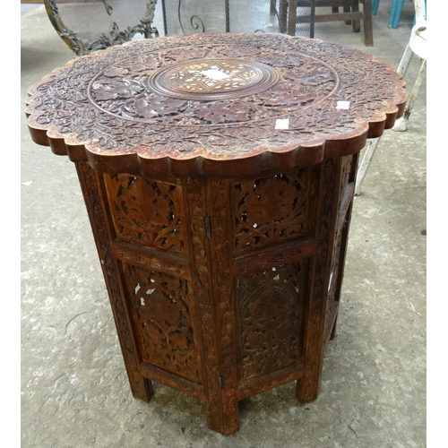 487 - Middle Eastern/Islamic design hardwood ornately carved side or lamp table. 
(B.P. 21% + VAT)