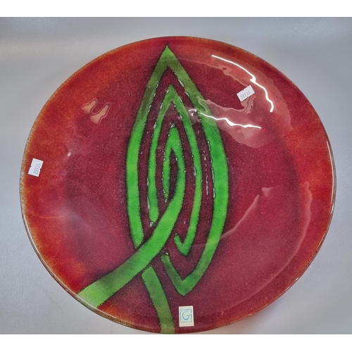 70 - 'Graphic glass' circular centre bowl in red and green colourway. 38cm diameter approx. 
(B.P. 21% + ... 