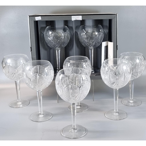 79 - Four Waterford crystal 'the Millennium Collection' toasting goblets, all in original boxes. Eight gl... 