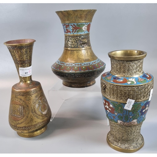 85 - Group of three yellow metal vases comprising two Chinese with champleve enamel banding and one Islam... 