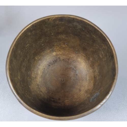 86 - Probably Indonesian brass Bokor bowl engraved with flowers and foliage. 10cm high, 11cm diameter app... 