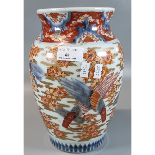 88 - Japanese porcelain baluster vase decorated all over with flowers, feathers and gilding in a typical ... 