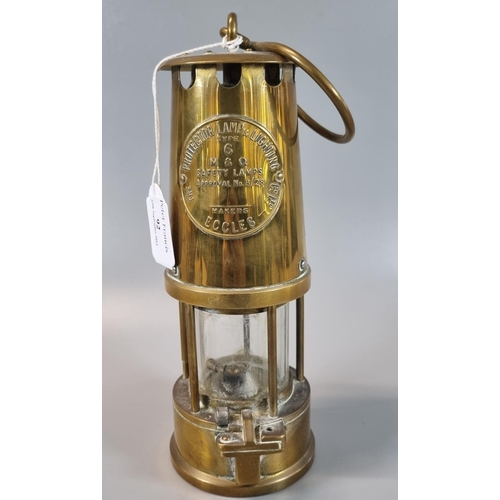 92 - The Protector Lamp & Lighting Co Ltd Eccles brass miner's safety lamp.
(B.P. 21% + VAT)