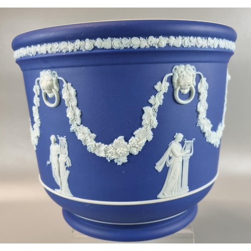 94 - Wedgwood blue and white Jasperware jardiniere decorated in classical style with lion mask heads, flo... 