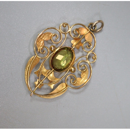 255 - 9ct gold and peridot Art Nouveau design pendant.  2.5g approx.  (B.P. 21% + VAT)