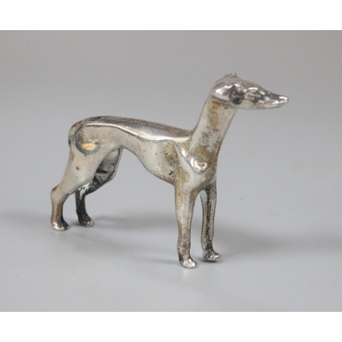 256 - Miniature silver study of a Greyhound or Lurcher dog.  0.55 troy oz approx.  (B.P. 21% + VAT)