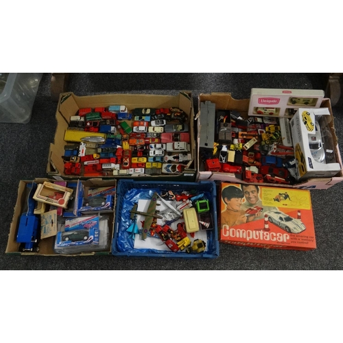 Two boxes of mainly playworn and diecast model vehicles: cars, planes ...