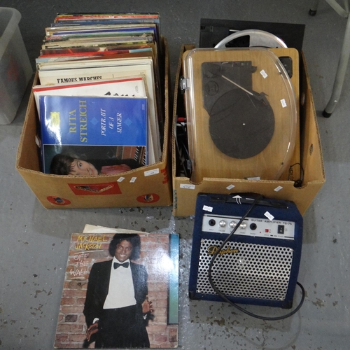 416 - Two boxes of musical equipment, accessories and vinyl records to include: a Daphon guitar amplifier ... 