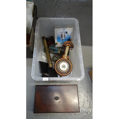 428 - Box of assorted items to include: cased wooden wall barometer, brass telescope, various leather and ... 